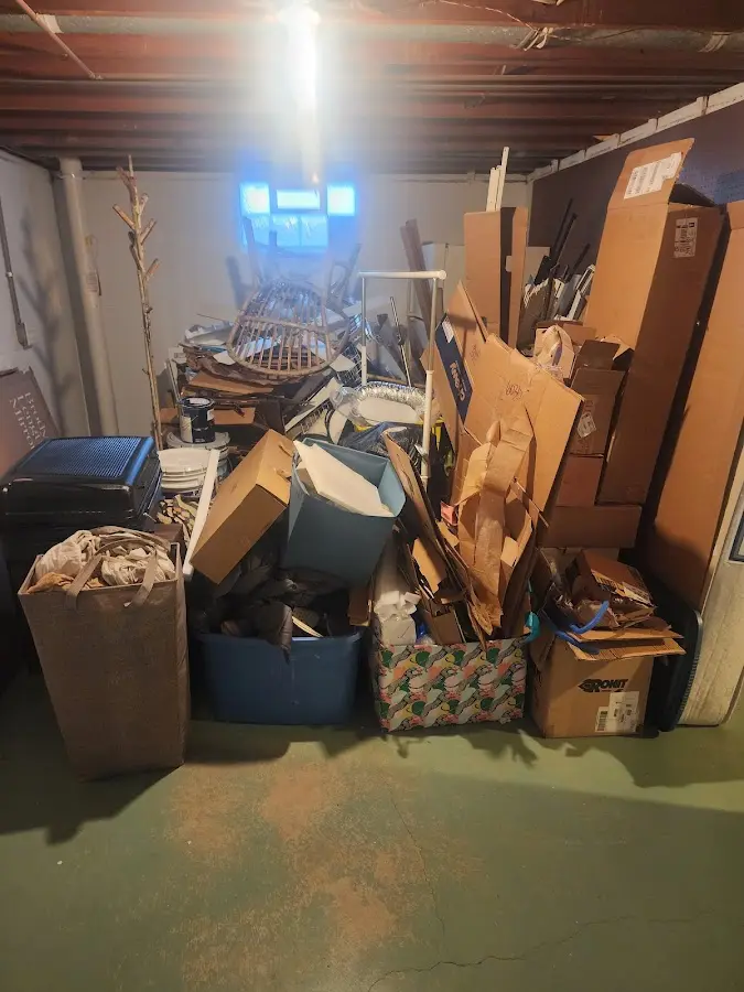 Roll-off dumpster container at job site for 2 Yard Dumpster Rental in Cooper City